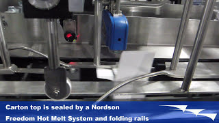 Vertical cartoner with horseshoe conveyor